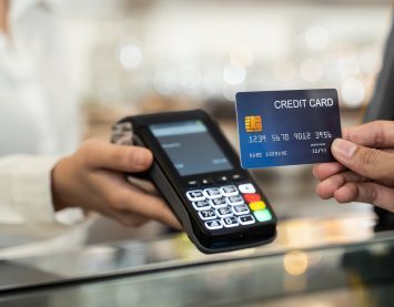 close-up-customer-hand-using-dummy-credit-card-for-new-q9k7g3y7p6vlvfifjbjdxml1hoyvnnsk2cn2imge4y