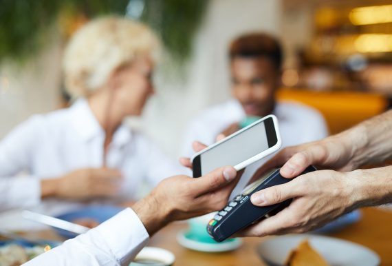 putting-smartphone-on-terminal-for-online-payment-2021-09-24-02-56-23-utc-q9k7g4w4ibamgymukut0syh63vqlfsifhxxkgz85n8